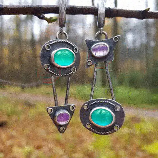 Mechaniczne kolczyki z vintage'owymi kryształami