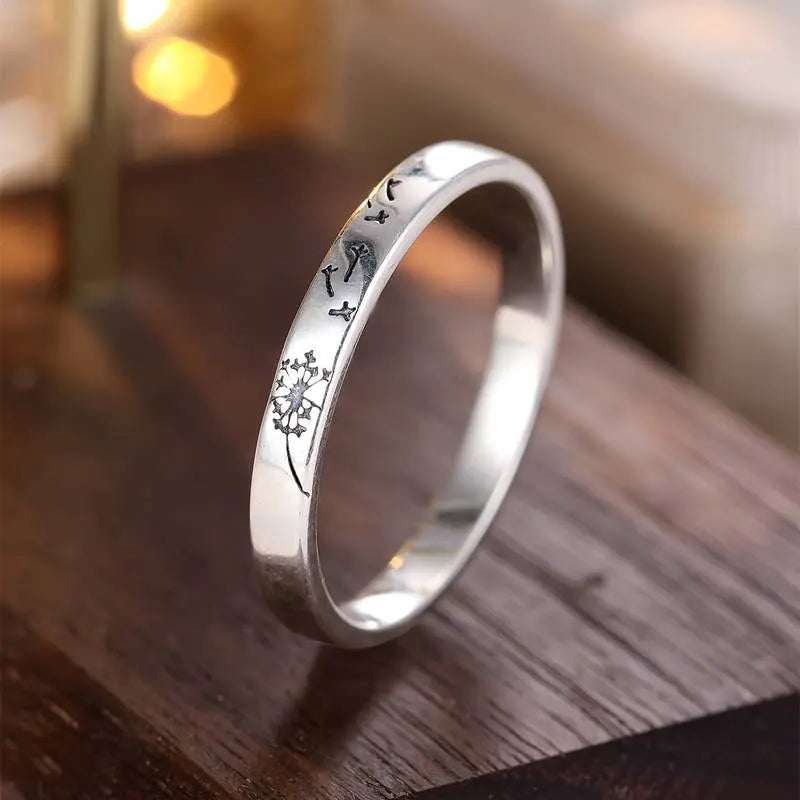 W retro pierścień z srebra z dmuchawcem