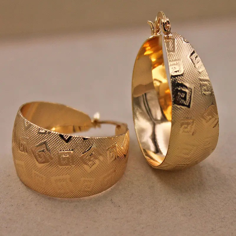 Etniczne kolczyki złote