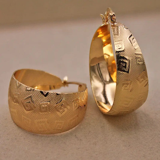 Etniczne kolczyki złote