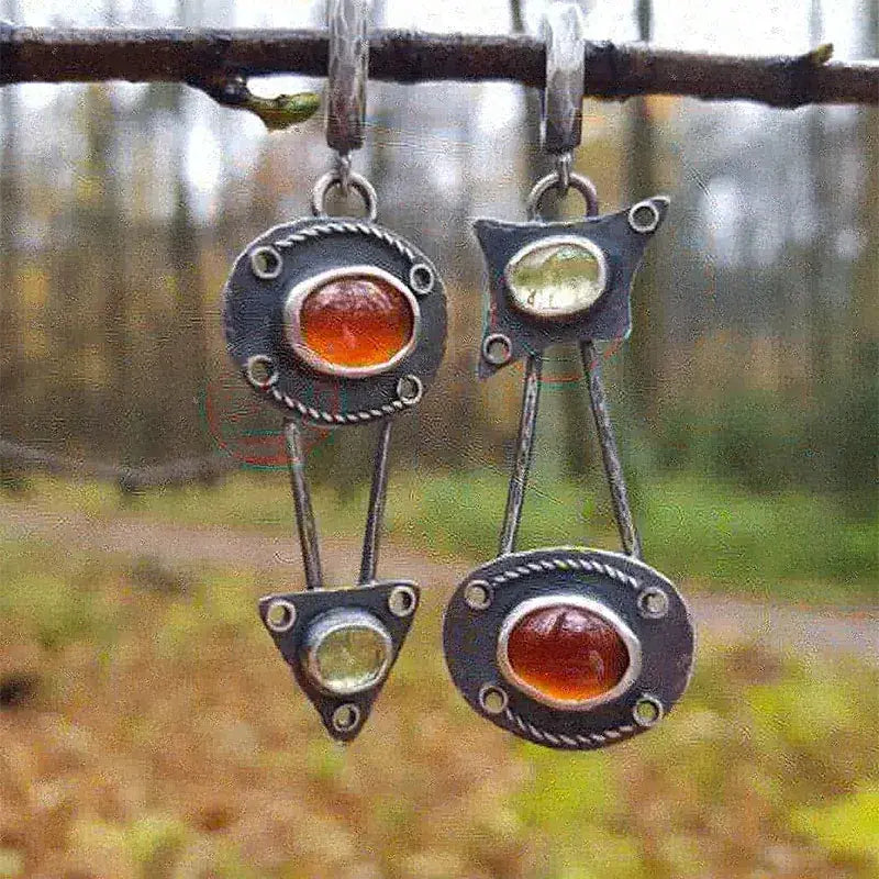 Mechaniczne kolczyki z vintage'owymi kryształami